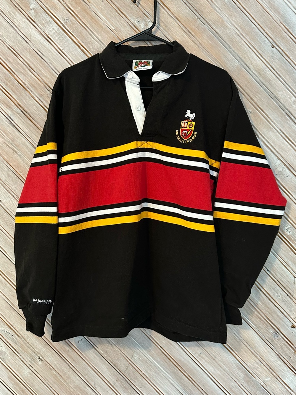 University of Guelph Barbarian Rugby Wear Black Shirt Red & Yellow Stripes